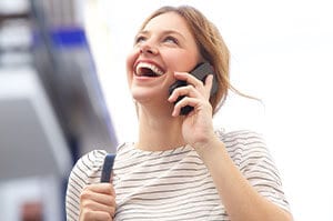 person on phone laughing